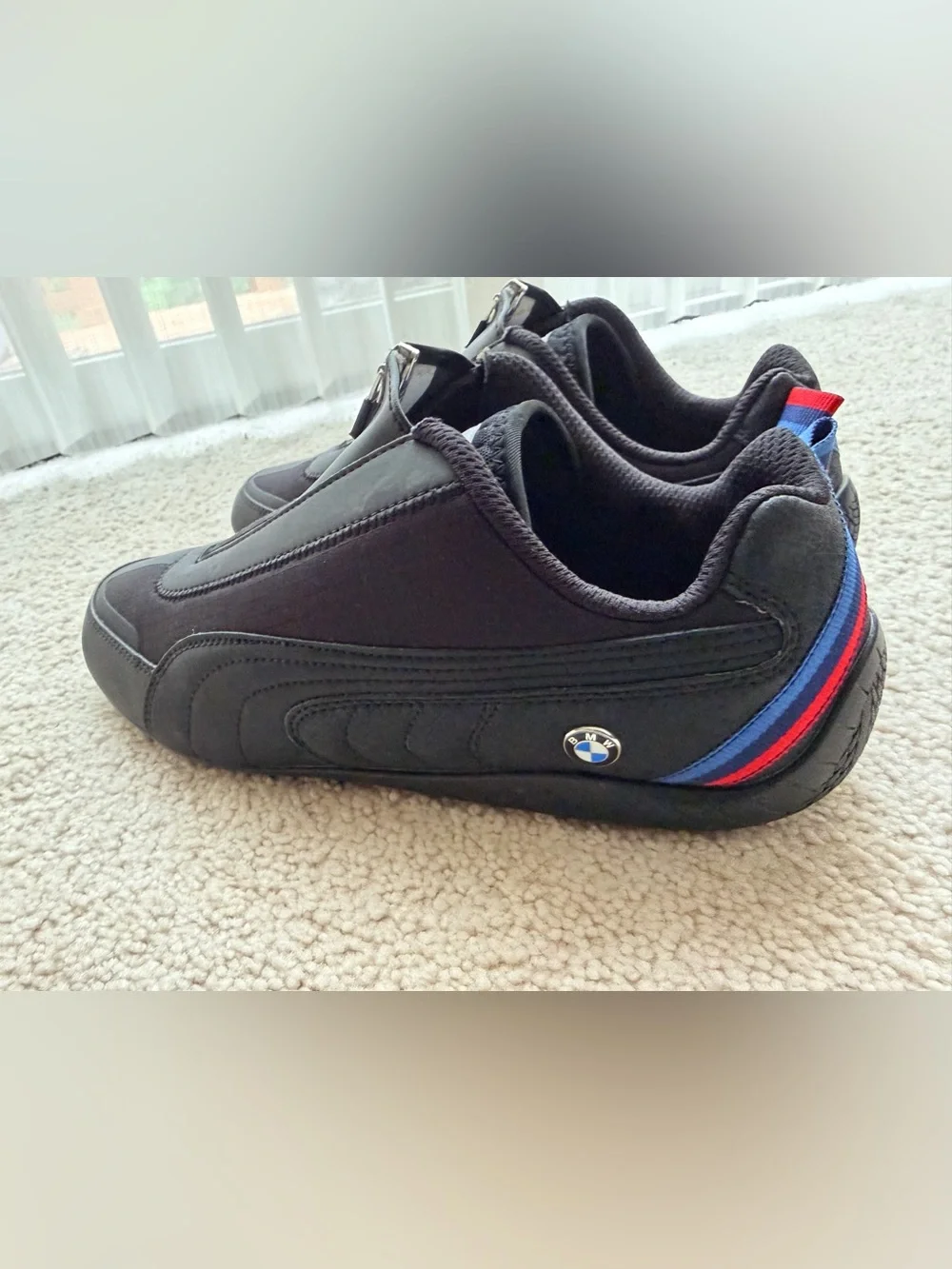 Puma Black low-profile Sneakers with Red & Blue Heel Accents